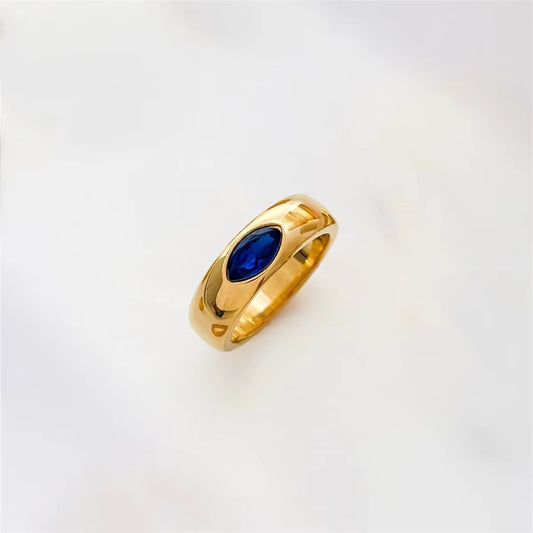 "Elegant and timeless – this delicate gold  18k ring with a deep blue gemstone adds a touch of luxury and meaning to every look."