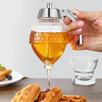 "שמור על כל טיפה של דבש, שמן או סירופ – כד אחסון נייד אלגנטי שמפגיש בין פרקטיות ליופי. מושלם למטבח, מספק סדר ונגישות מיידית, והופך כל רגע של בישול לחוויה נעימה ומיוחדת."